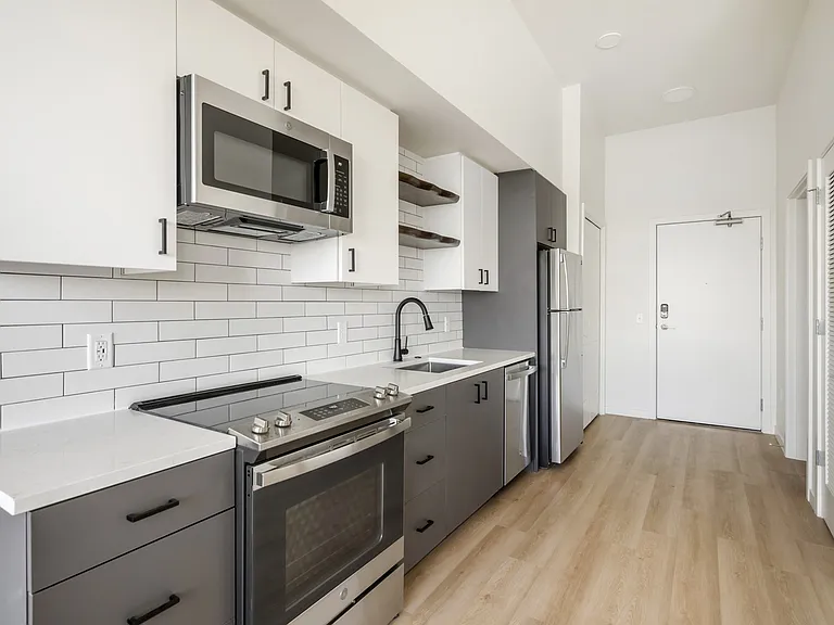 Kitchen in Studio Apartment Homes