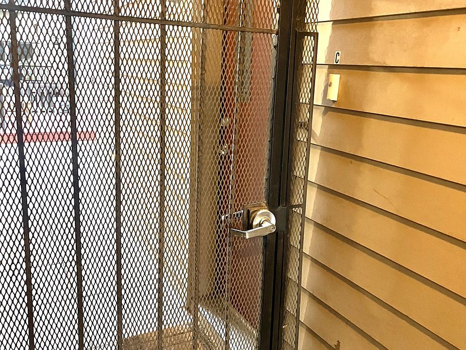 Entrance located behind a locked gate for extra security.