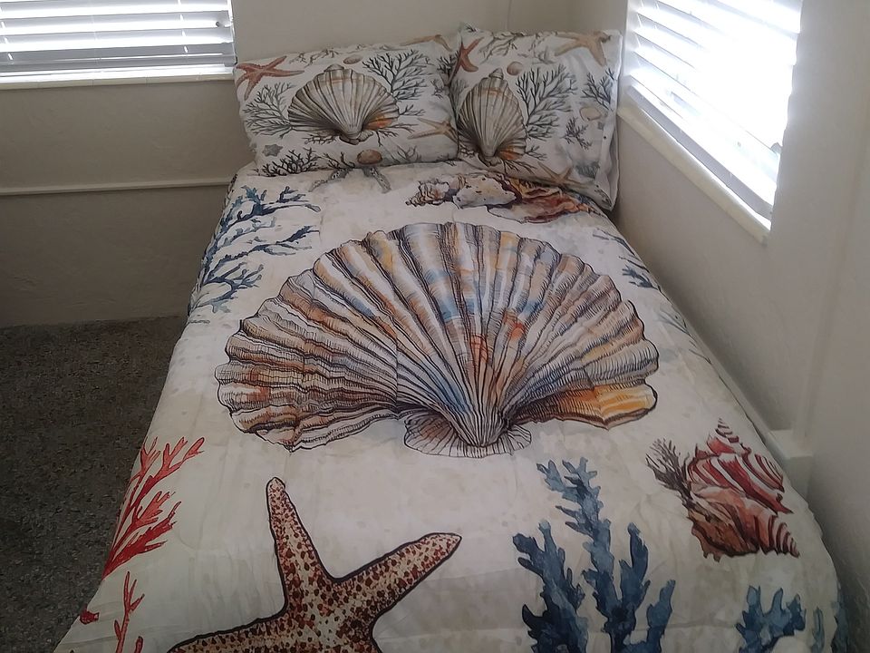 New twin bed mattress and linens. Room for storage under bed.
