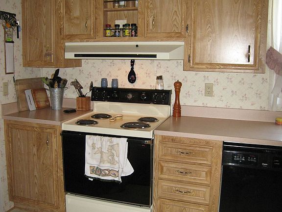 This is not a tiny kitchen...you'll have lots of room to move around