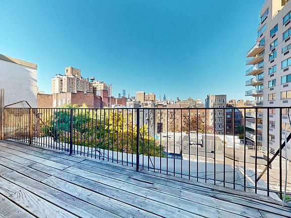 3rd image of 337 E 9th St #Penthouse