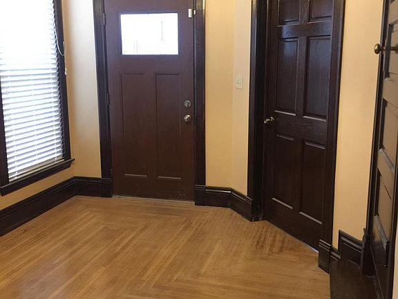 Entry Foyer. Front door on left and front room door on right