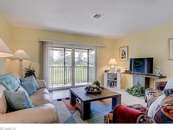 Living Rm With Beautiful Golf Course View