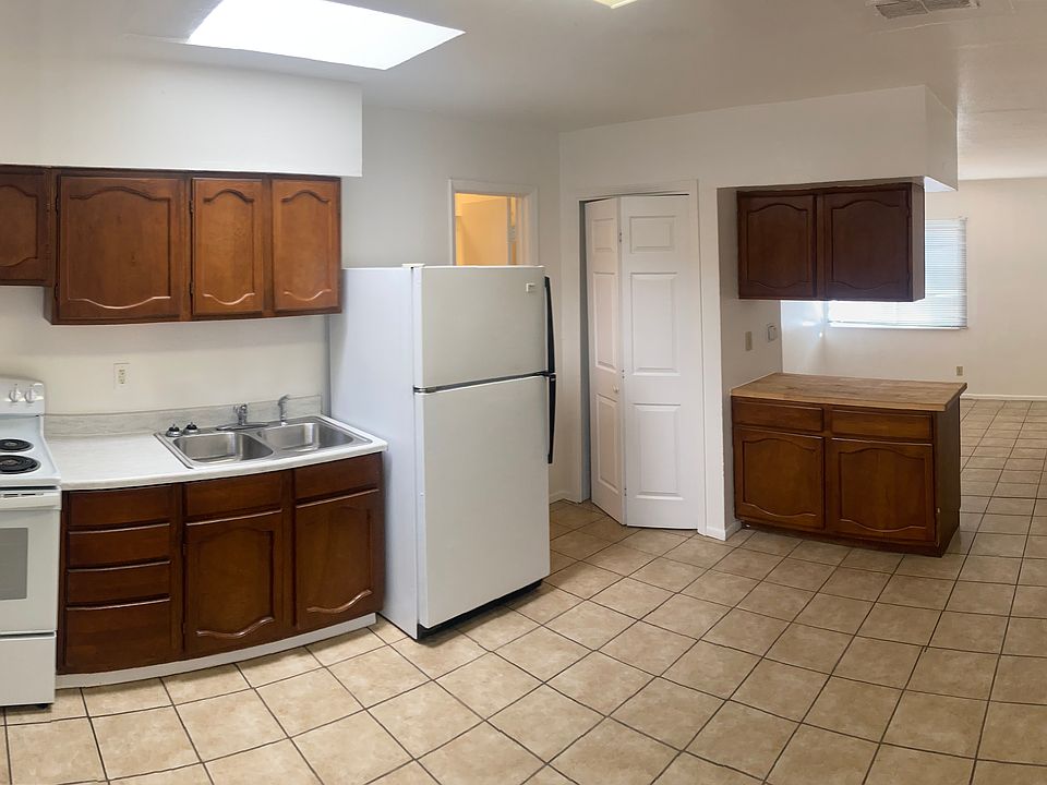 Clean updated Kitchen & Studio looking south to Bedroom