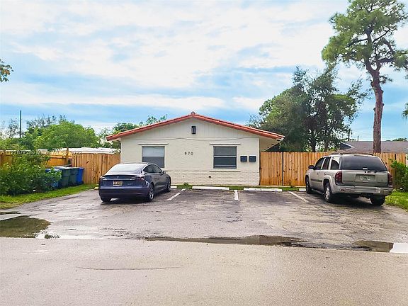 Feels like a Single Family Home, Unit has two entrances. Two Parking Spaces.
