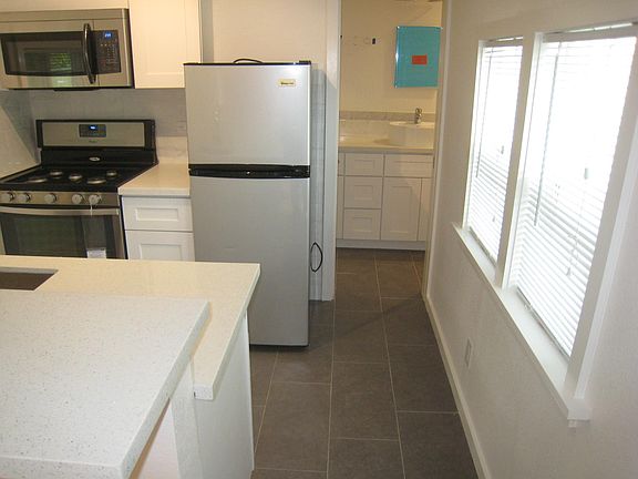 Kitchen and Entrance to the Bathroom to the Right