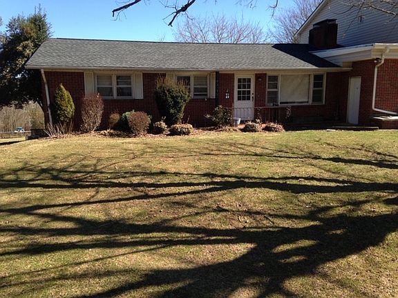 Front of the home. Side garage entrance door.