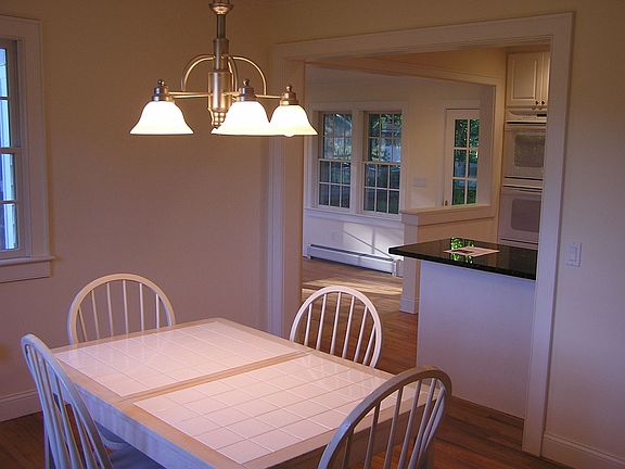 Dining room looking into sunroom