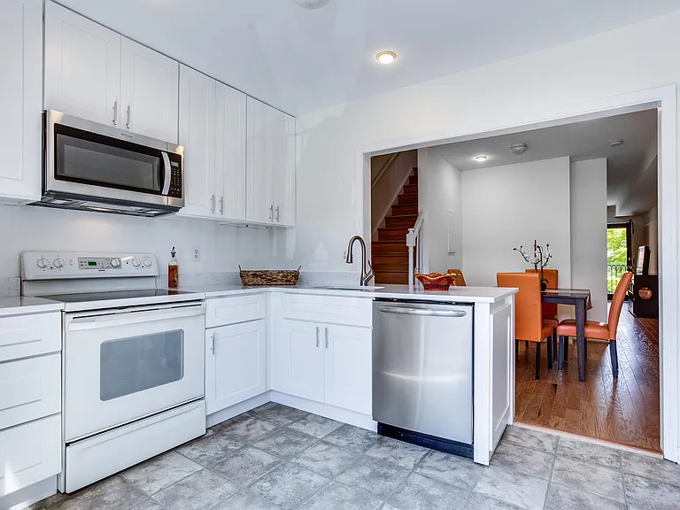 Kitchen opens to dining room.