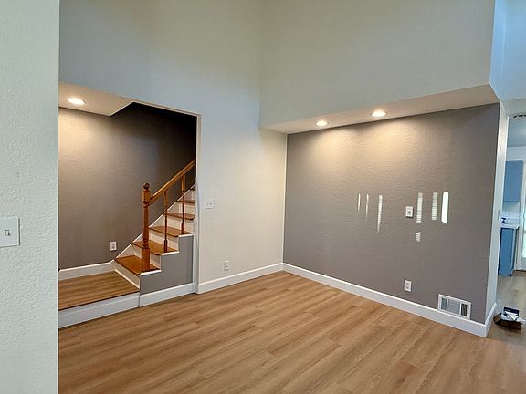 living room walking towards kitchen