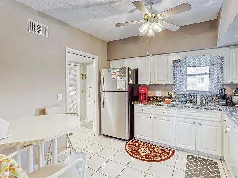 Kitchen comes with a refrigerator with ice maker, microwave, stove, oven, dish washer, plenty of cabinet space.
