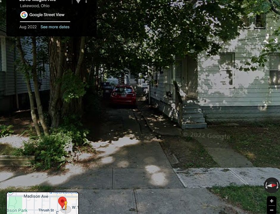 Rental property located BEHIND the driveway.