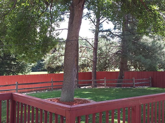 entirely fenced back yard