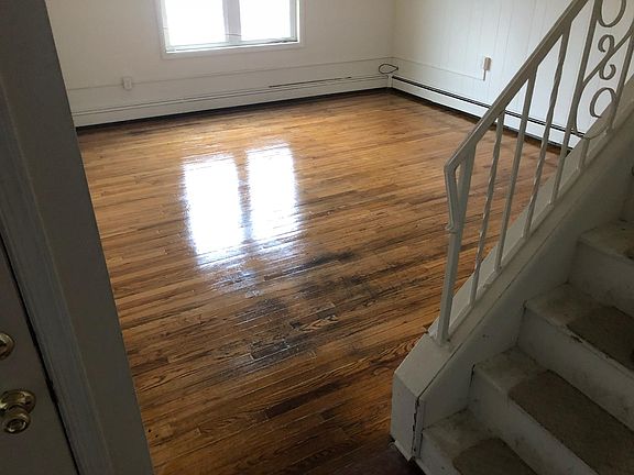 Living room with hardwood floors, just refinished