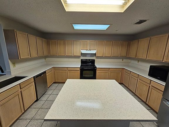 Kitchen Refresh with Quartz coountertops, island, new inset stainless sink and new 29 cuft LG frenchdoor refrigerator