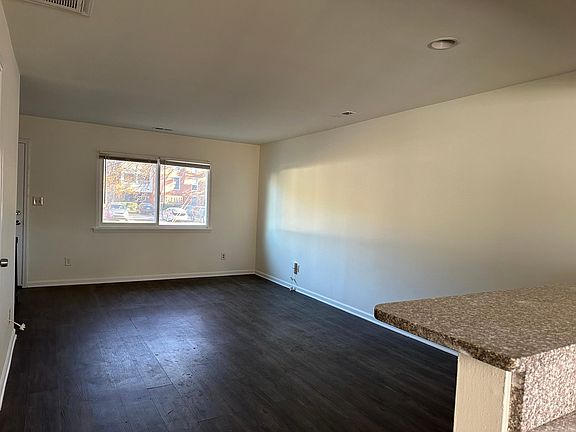 spacious area for living room and breakfast area, hardwood floor installed in 2021