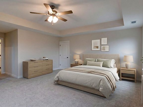 Large Bedroom with Tray Ceiling and access to en-suite bathroom