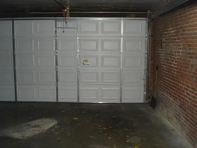 Private parking space for one small vehicle. Remote control entry provided
