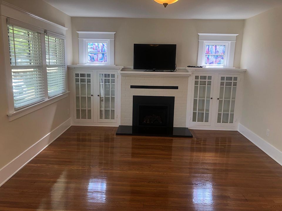 Living room, bookcases, fireplace