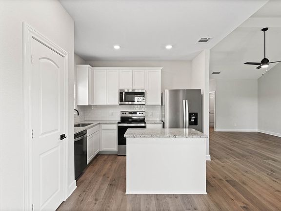 The kitchen of the Sabine floor plan has energy-efficient appliances.