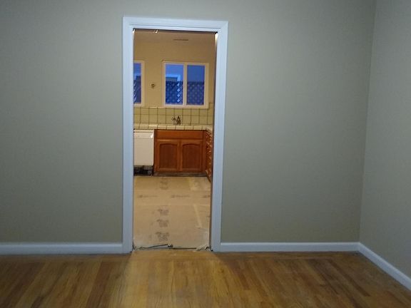 Looking into kitchen through dining area