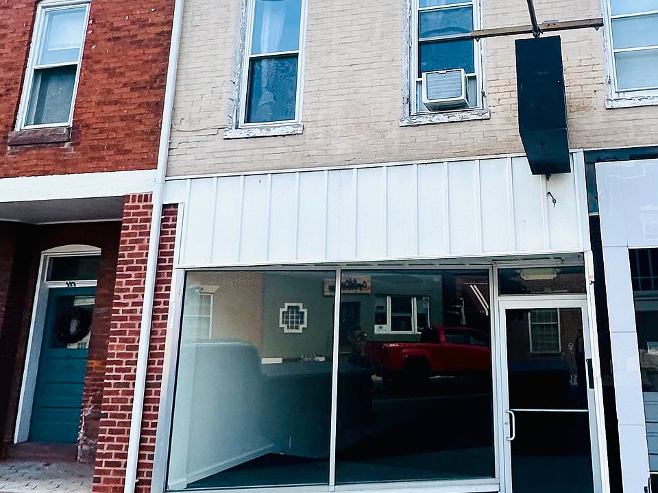 113 Baltimore St 1st Fl. Studio Live/Work Apt - Exterior View From Sidewalk, Tenant Has Used Of Hanging Sign With Owner Approval)