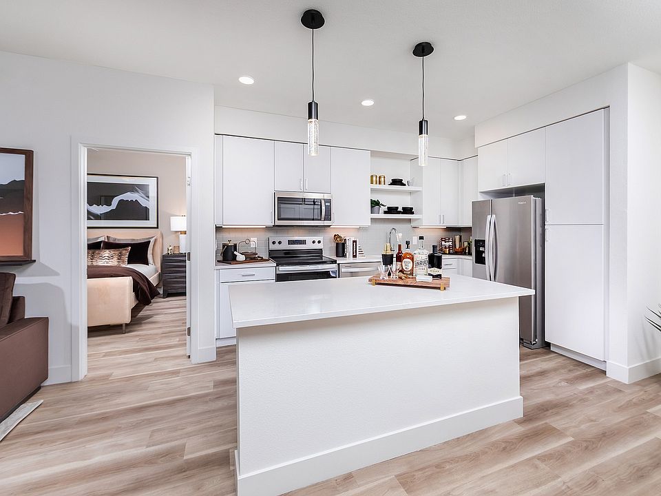 Kitchen with prep island and light wood style flooring
