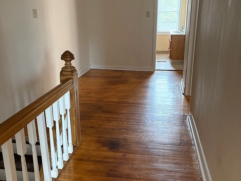 Upstairs hallway looking toward bathroom