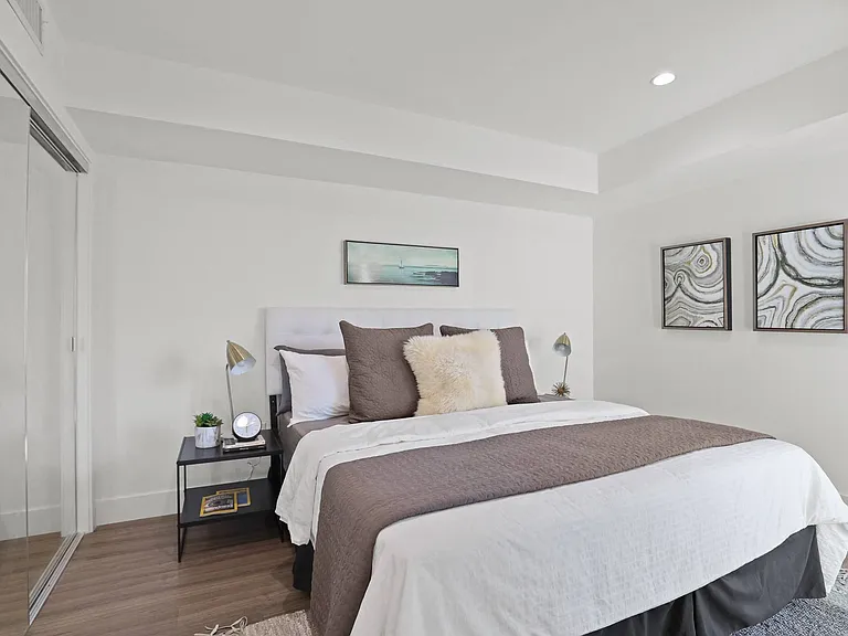 Spacious Bedrooms With Closet, Vinyl Flooring, and Recessed Lighting