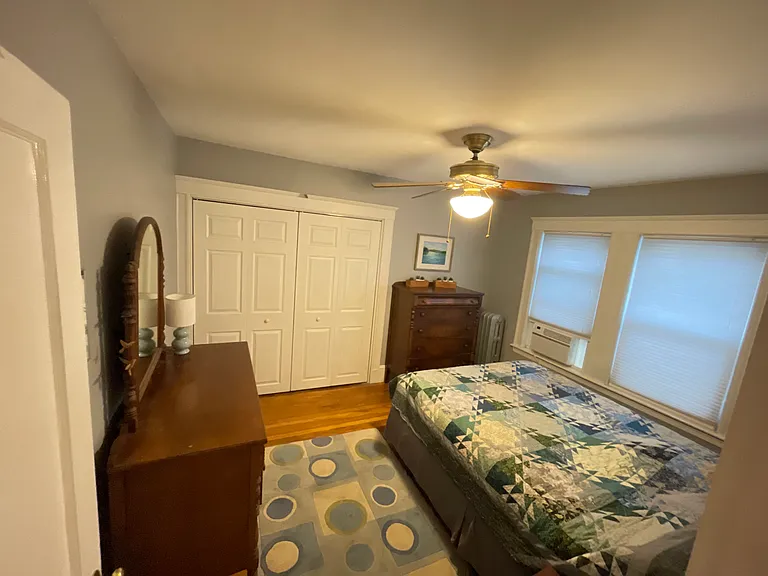 Primary bedroom w custom built closet