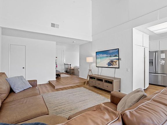 The family rm./kitchen leads to the backyard. There is room enough for casual eating aside from the dining area off of the living rm. The pics. are from a former tenant who turned this home into something special.