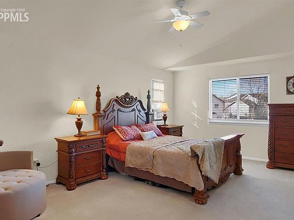 The master bedroom has enough room for a sitting area!