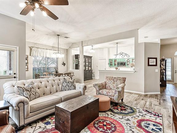 Open floor plan. Beautiful tile floors flow through the home.