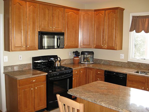 Kitchen has custom Yorktown cabinets