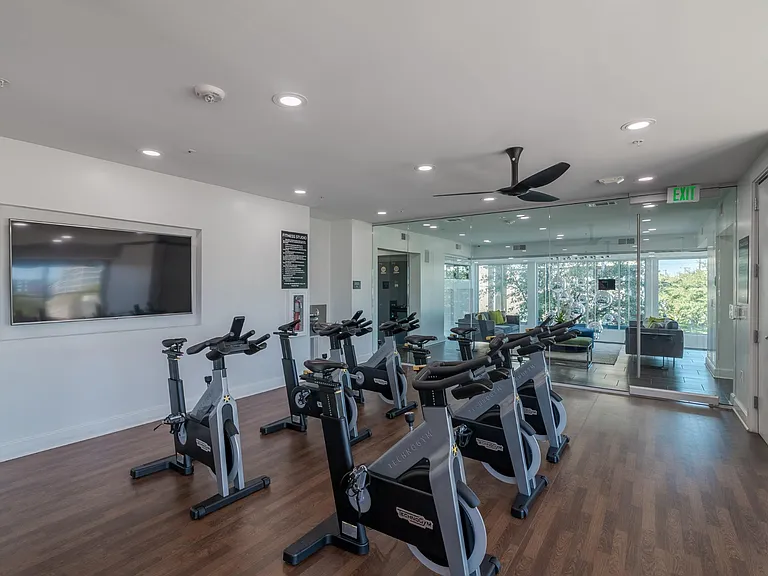 Private Cycle Room in the Fitness Center at Abstract at Design District in Dallas TX, 75207