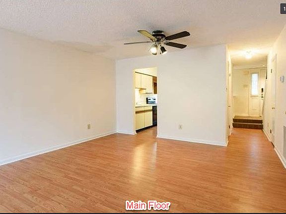Main Floor - Living Room , Dining Room and fireplace - Leads to full deck