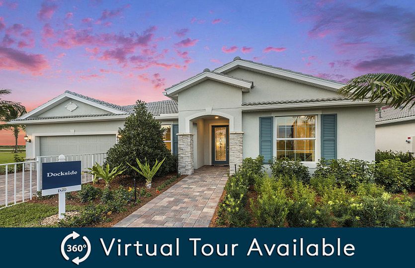 The Dockside, a single-story home with a 2 car garage, shown as Home Exterior FM2A