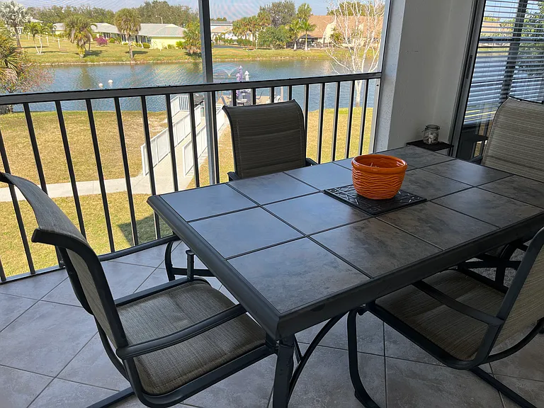 Screened in private lanai overlooking the lake.