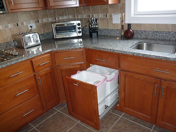 Stainless pulls, disposal, in-drawer double trash caddy