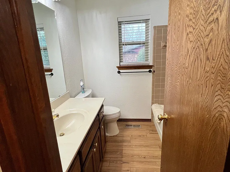 Hall Bathroom with tub and shower