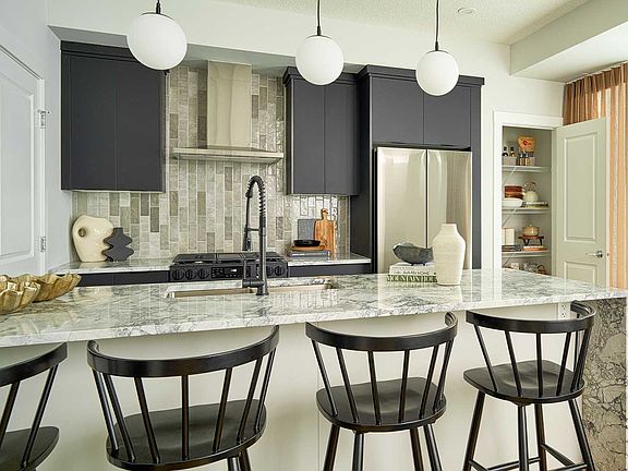 A photo of the kitchen of the Brubeck townhome model in Calgary by Brookfield Residential