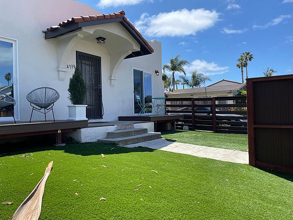 Private gated yard with two decks