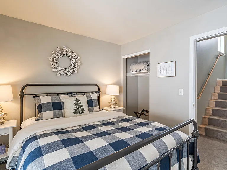 Bedroom 3: Queen bed. Ensuite bathroom. Walk out to backyard.