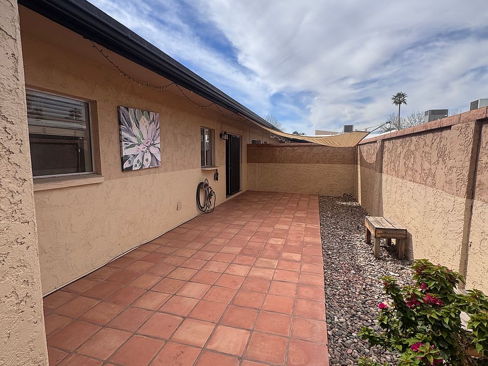 private enclosed rear patio off the kitchen
