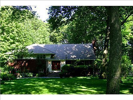 Comfy Family Room with FPL Overlooking Yard