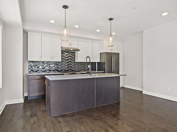 3rd image of 207 E 5th Ave