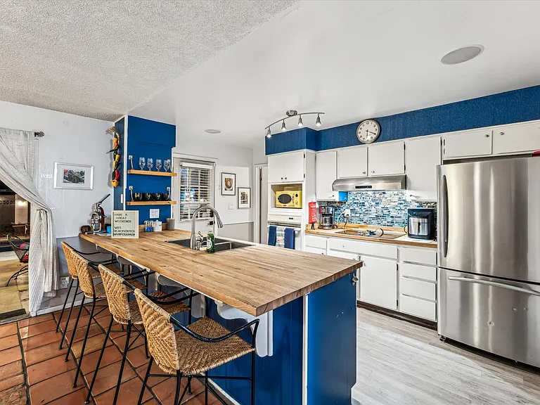 A sleek and modern kitchen with everything you need to cook, entertain, and create memories.