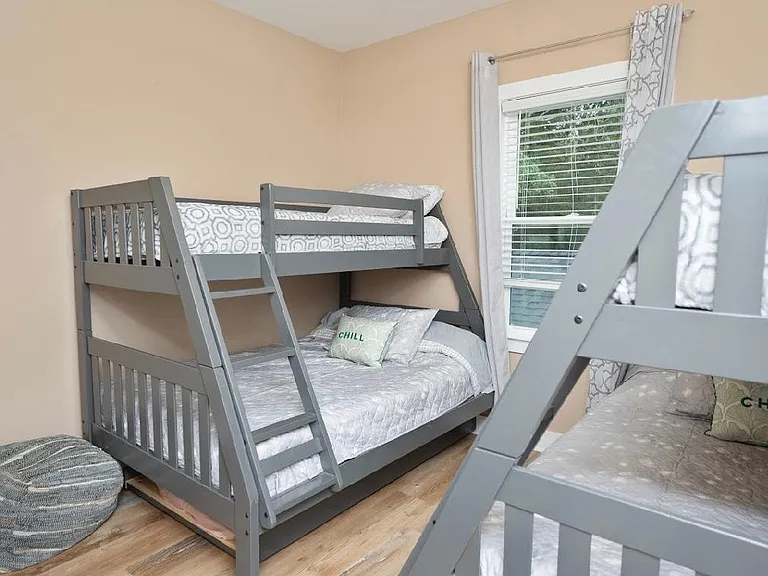 3rd bedroom with 2 bunk beds and own TV