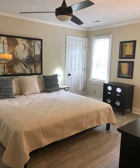 Primary bedroom with king bed and ensuite.