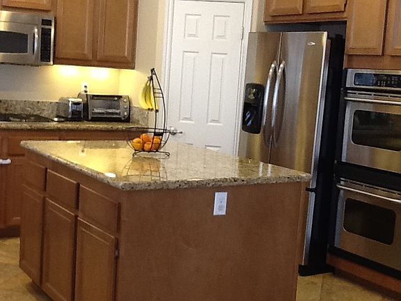 Kichen island and walk-in pantry